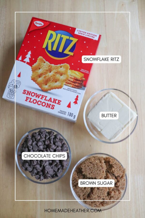 A box of Snowflake Ritz crackers, a bowl of butter, a bowl of chocolate chips, and a bowl of brown sugar are arranged on a wooden surface, each labeled with text.