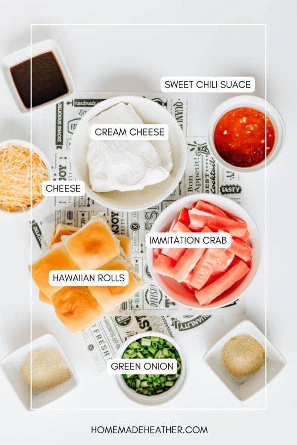 Top view of ingredients for a recipe, including bowls of cream cheese, shredded cheese, sweet chili sauce, imitation crab, green onion, Hawaiian rolls, soy sauce, and seasonings, each labeled with text.