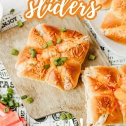 Crab Rangoon sliders garnished with chopped green onions on a wooden board, surrounded by imitation crab sticks. The text reads Crab Rangoon Sliders and So Good! over the image.