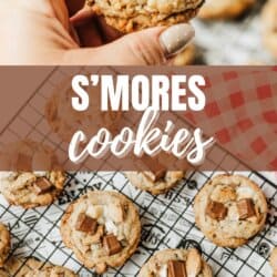 A hand holds a s’mores cookie topped with chocolate chunks and marshmallows. Below, several similar cookies cool on a wire rack. Text reads, “S’mores cookies.” Website: homemadeheather.com.