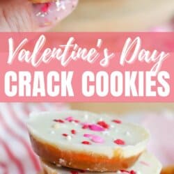 A close-up of Valentines Day crack cookies with a white chocolate topping and heart-shaped sprinkles, some stacked on a plate and one held with a bite taken out. Text reads Valentines Day Crack Cookies and homemadeheather.com.