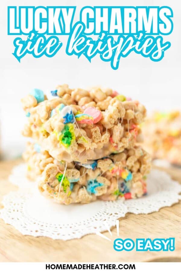Three marshmallow cereal treats made with Lucky Charms and Rice Krispies are stacked on a doily. Blue and white text above reads “Lucky Charms rice krispies.” Bottom text says So easy! and homemadeheather.com.