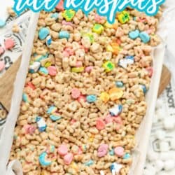 A tray of Lucky Charms Rice Krispies treats sits on a table with colorful marshmallows visible. Text above reads, “Lucky Charms rice krispies,” and below, “So easy!” with the website homemadheather.com.