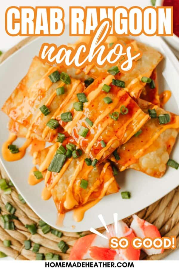 A plate of crispy crab rangoon nachos topped with orange sauce and chopped green onions, with text reading Crab Rangoon Nachos and So Good! at the bottom. Website: homemadeheather.com.