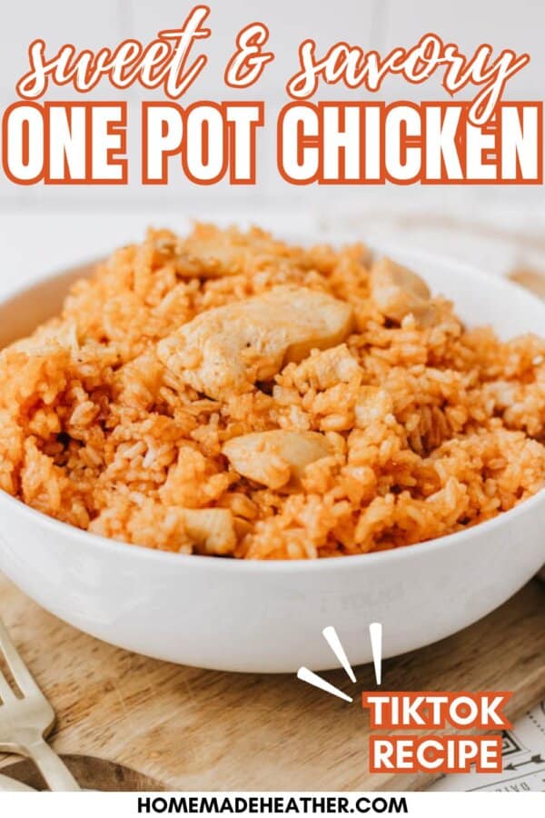 A white bowl filled with orange-colored rice and chicken pieces, labeled Sweet & Savory One Pot Chicken and TikTok Recipe. The website homemadetheather.com is at the bottom. A fork is next to the bowl.