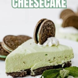 A slice of mint Oreo cheesecake with a chocolate cookie crust, light green mint filling, and whipped cream, topped with an Oreo cookie. Fresh mint leaves and more Oreo cookies are in the background. Text reads Mint Oreo Cheesecake, So Easy.